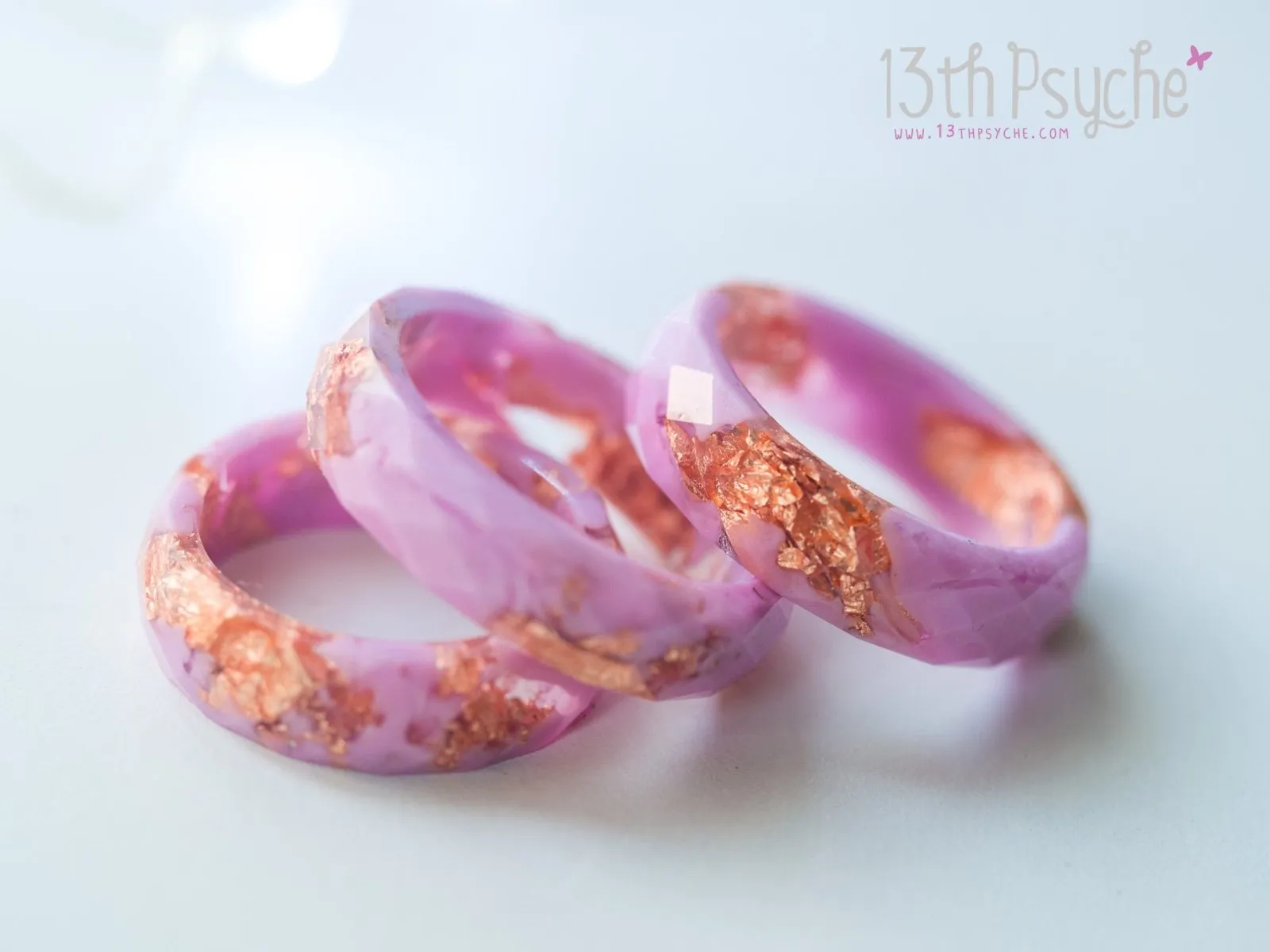 Pink and rose gold flakes faceted resin ring